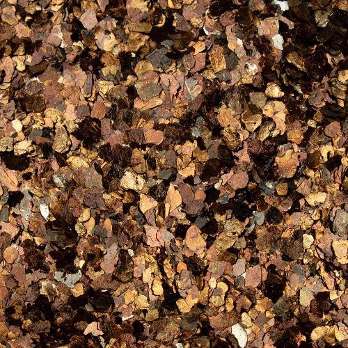 A textured, mosaic-like pattern of irregular flakes in shades of copper, bronze, gold, and dark brown.