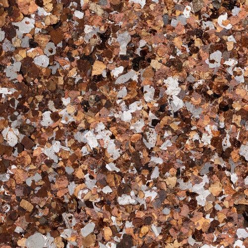 A textured close-up of decorative floor flakes in varying shades of copper, brown, white, and gray.