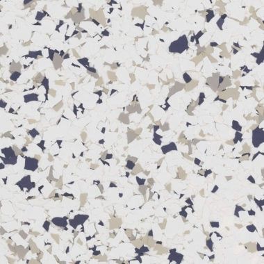 A light gray textured surface with a speckled, multi-colored pattern of small black, white, and tan flecks.