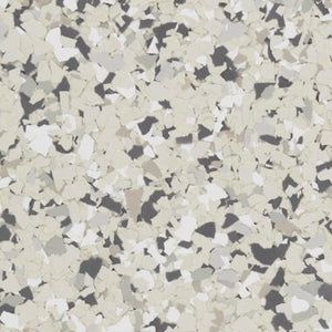 A textured, speckled flooring pattern featuring a mix of cream, light gray, and dark charcoal vinyl flakes.