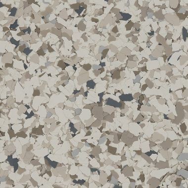 A high-angle view of a speckled floor coating featuring a mix of beige, cream, dark gray, and light gray flakes.