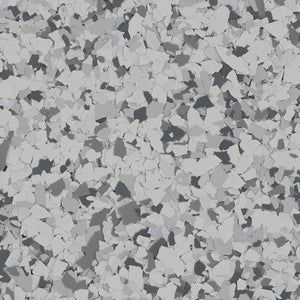 A textured surface with a speckled pattern of overlapping gray, dark gray, and white vinyl flakes.