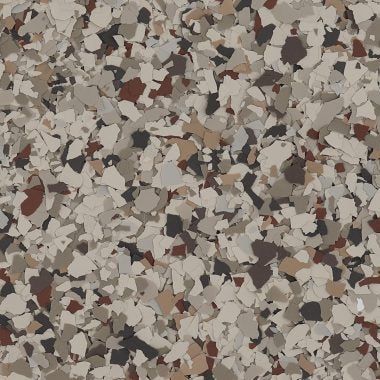 A close-up view of epoxy flooring material with a multi-colored flake texture in shades of tan, brown, white, and black.