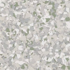 A decorative floor coating with a speckled pattern of small, overlapping flakes in shades of white, light gray, and sage.