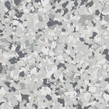 A decorative flooring texture featuring a dense mix of gray, white, and black vinyl flakes in a granite-like pattern.