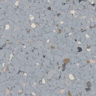 A textured surface featuring a dense pattern of light grey, white, cream, and dark grey flecks resembling epoxy flooring.