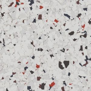 A seamless pattern of white, gray, black, and red vinyl flakes used for epoxy flooring surfaces.