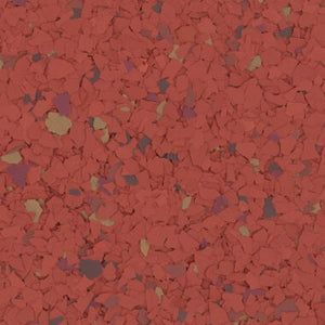 A textured surface with a rust-red base flecked with small, irregular brown and dark gray chips.