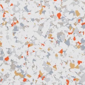 A textured surface with a white base speckled with small, irregular chips of orange, light grey, and tan colors.