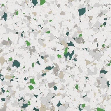 Decorative floor flake finish with scattered white, grey, green, and dark teal chips on a light grey background.