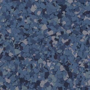 A close-up view of a blue and grey decorative vinyl flake floor coating with a speckled, multi-tonal texture.
