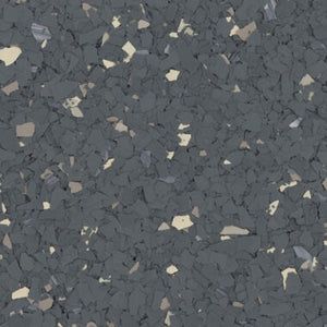 Gray epoxy flooring with scattered, multicolored flecks throughout the surface.
