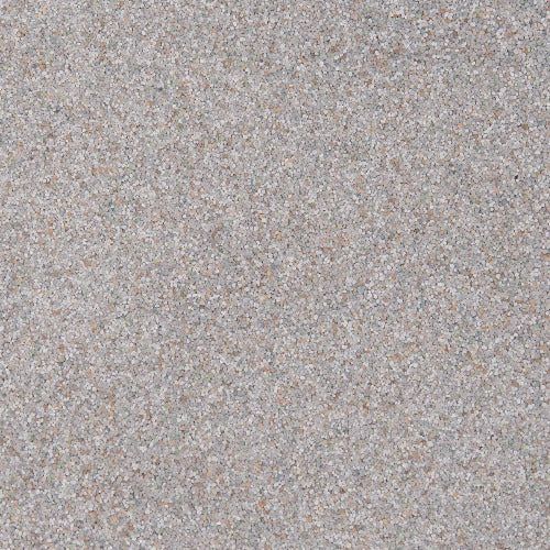 A close-up, textured surface of light gray and beige flecked material, resembling granite or composite countertop.