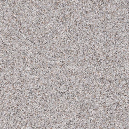 A close-up of a speckled stone surface with a textured pattern of light gray, beige, and white flecks.