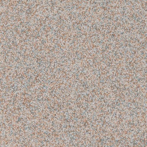 A close-up of a granite-like stone texture featuring a speckled mix of muted pink, grey, and brown particles.