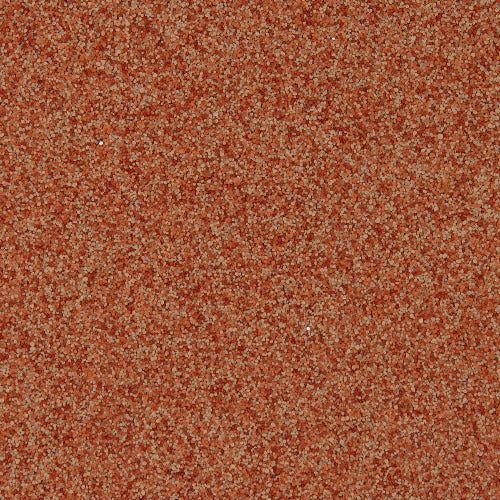 A close-up texture featuring a uniform, dense pattern of speckled terracotta and light beige particles.