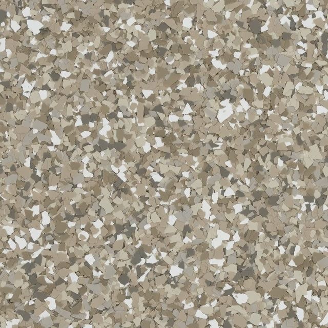 A close-up of a neutral-toned vinyl flooring or epoxy coating with a speckled, multi-color flake pattern in tan and grey.