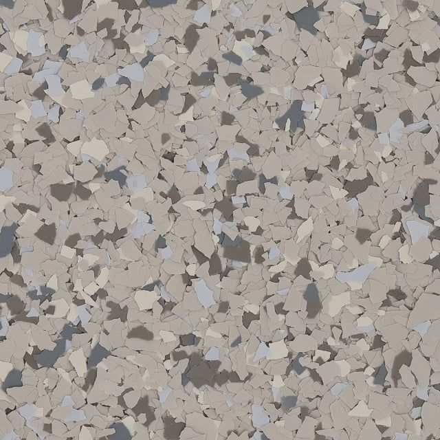 A close-up texture of decorative vinyl floor flakes in shades of beige, gray, white, and dark brown.
