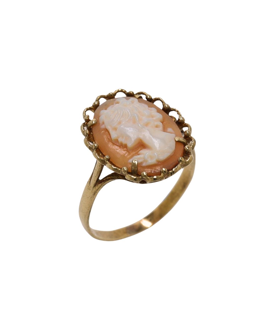 A gold bar brooch featuring a central oval shell cameo of a profile portrait, attached to a safety pin by a thin chain.