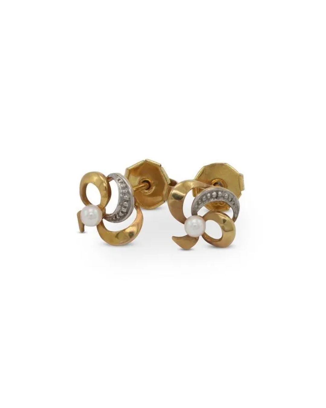A pair of gold earrings featuring swirling gold designs, small white pearls, and thin, diamond-studded silver accents.