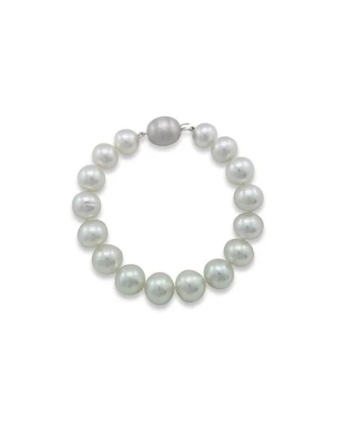 A white pearl bracelet arranged in a circle against a white background, featuring a matching oval-shaped pearl clasp.