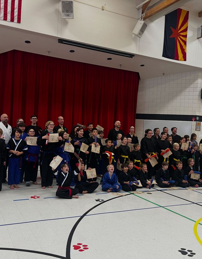Small karate class at Kaizen Academy in Gilbert with instructor giving personal attention
