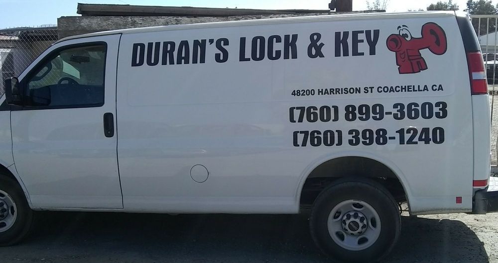 A white van with duran 's lock and key written on it