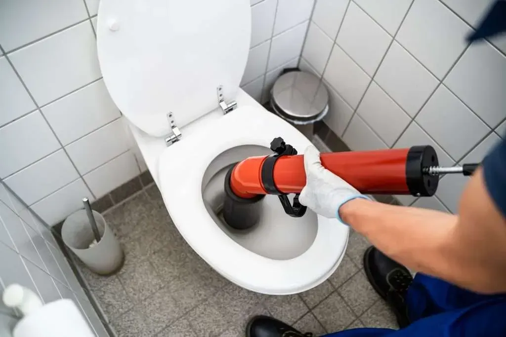 Experienced plumber in Anaheim Hills, CA maintaining commercial plumbing systems