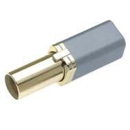 Adattatore color oro metallizzato con corpo rettangolare grigio su sfondo bianco.