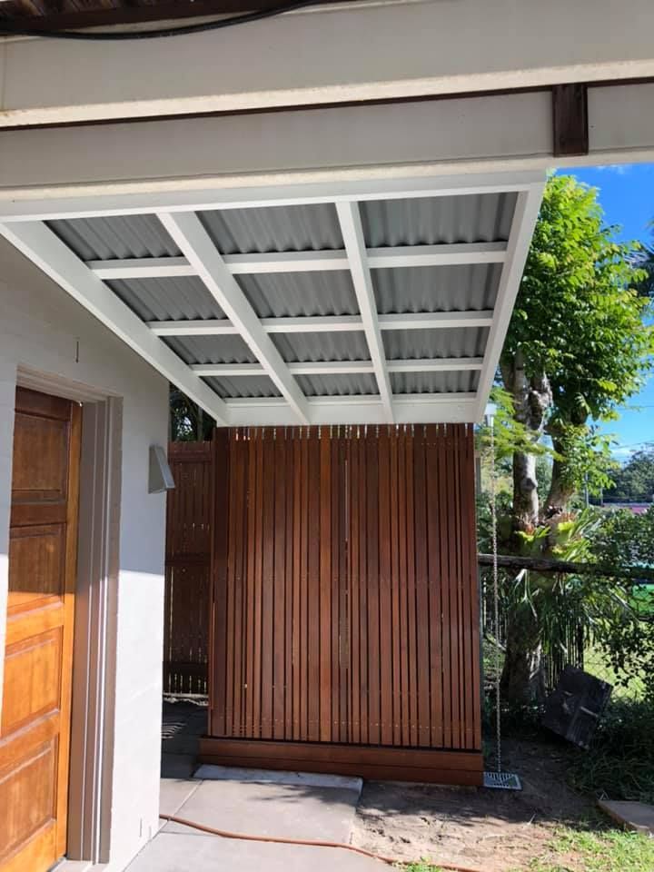 A Wooden Shower Enclosure Under a White-frame — Allman's Painting in Noosa, QLD
