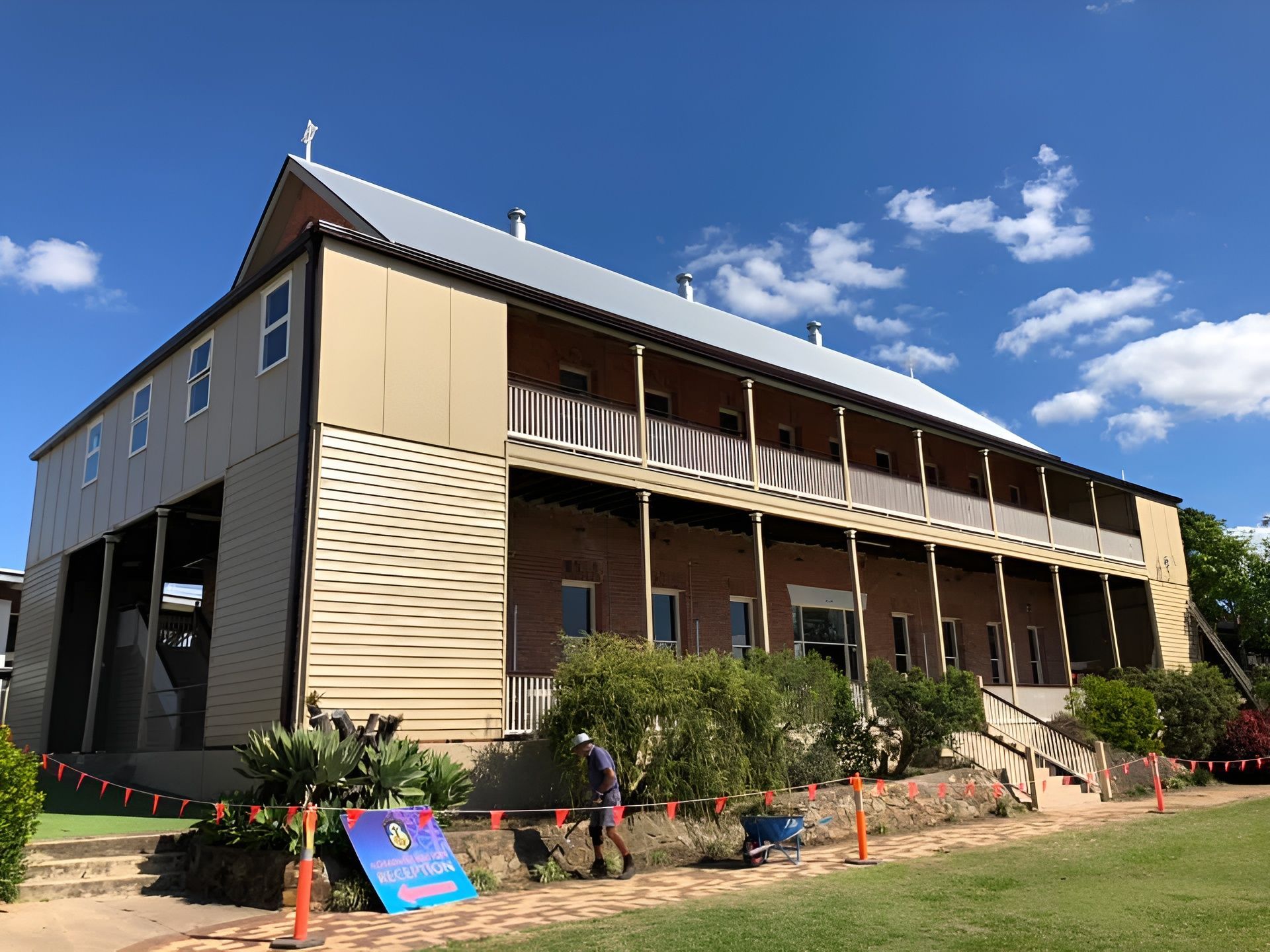 Two-story Building With Tan Siding and a Balcony — Allman's Painting in Cooroy, QLD