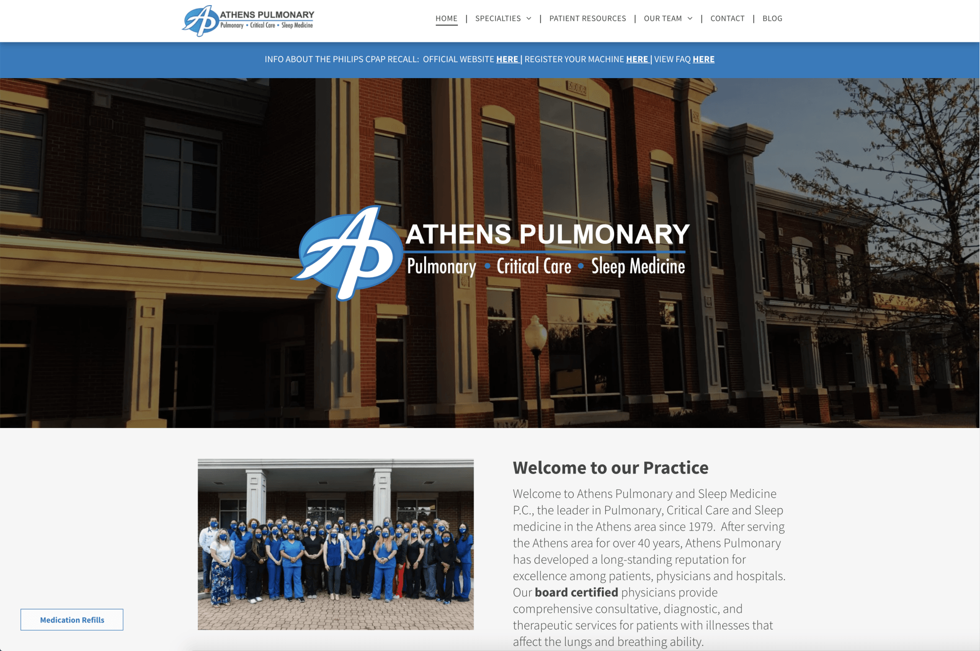Athens Pulmonary clinic website homepage with group photo and welcome text beneath a storefront banner