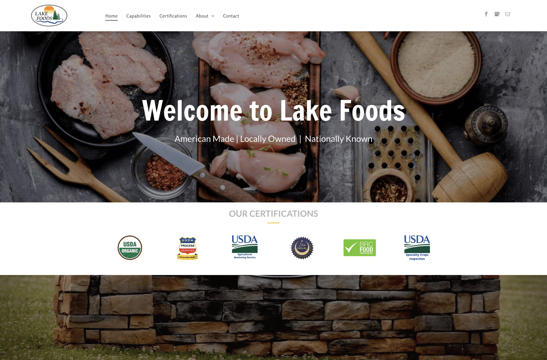 Lake Foods website homepage with food ingredients, logo badges, and a stone wall banner