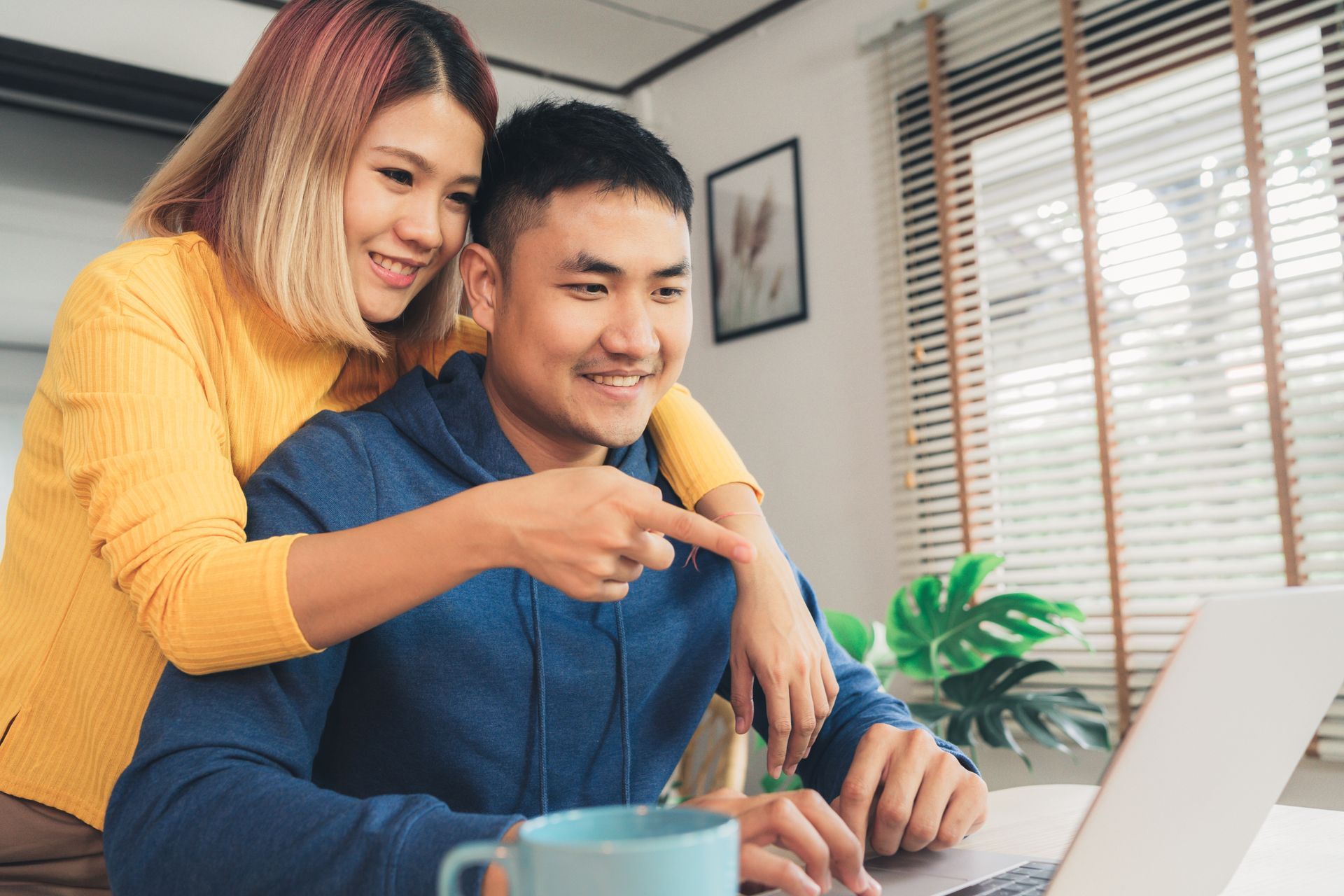 couple working on laptop