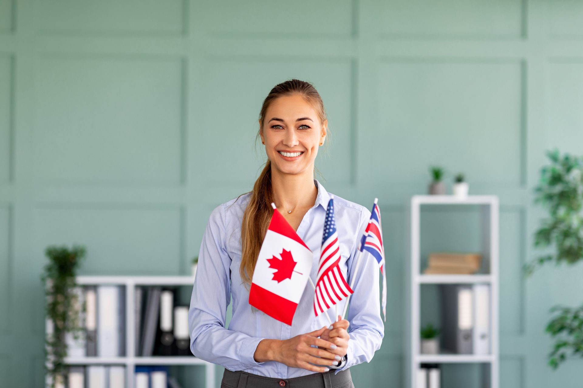 woman holding multiple flags