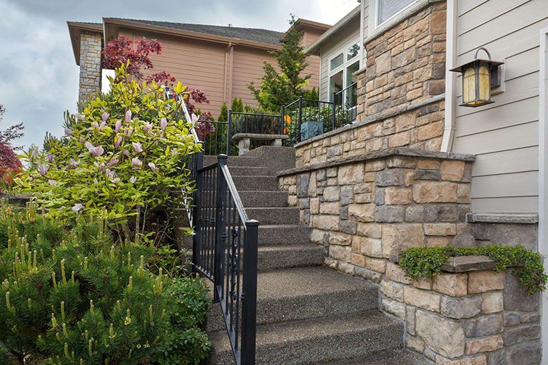 Stairs leading up to the front of a house.
