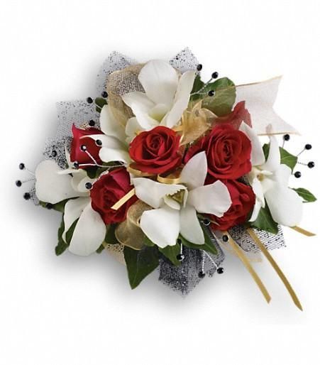Red and white rose bouquet with white lilies and greenery