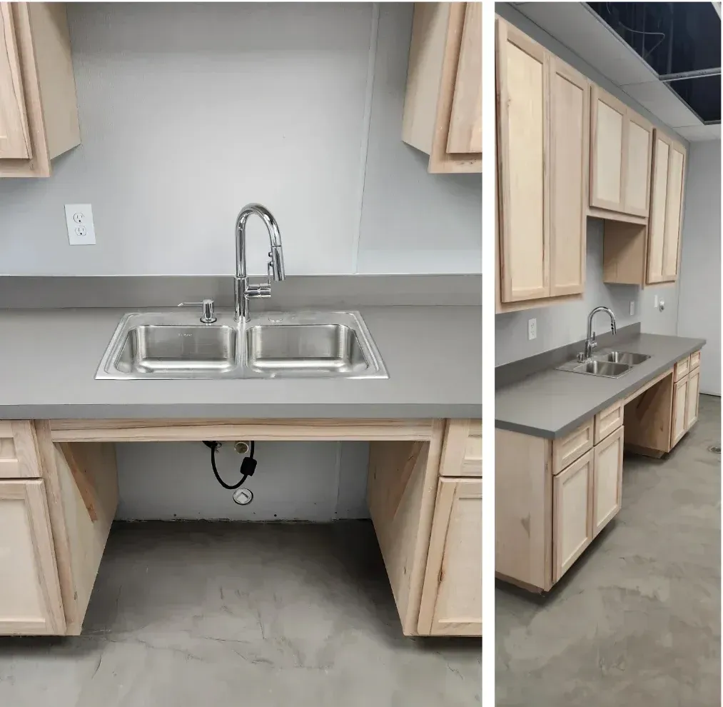 Two-panel view of a light wood-colored kitchen-like area with grey countertops, a double sink, and cabinets, partially accessible.