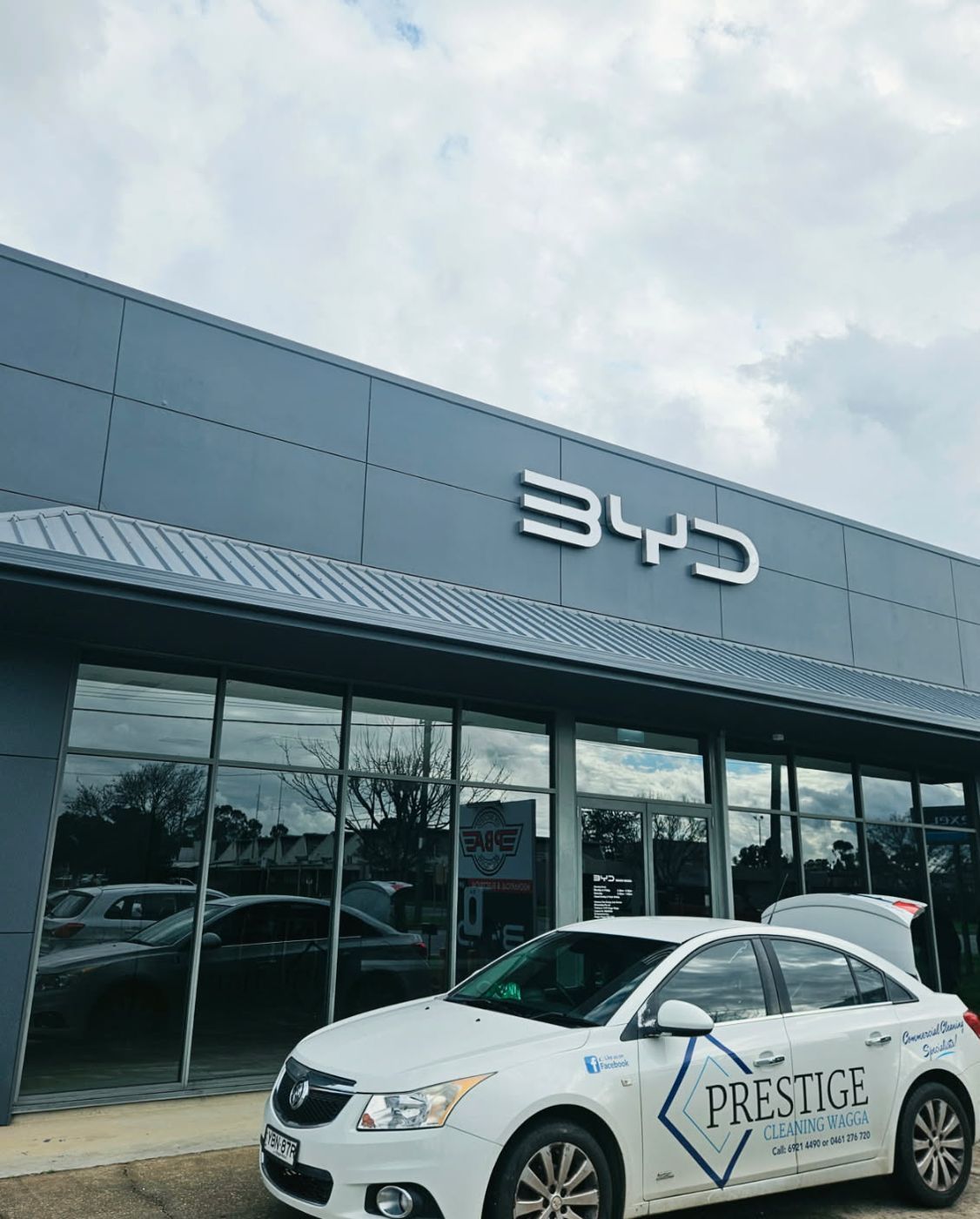 BYD Wagga dealership with a Prestige Cleaning Wagga car out front