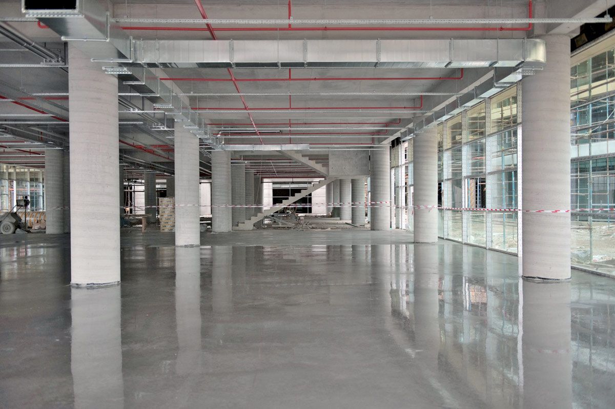 A Large Empty Building with A Concrete Floor — Petone, Waikato — Industrial Floor Care A Large Empty Building with A Concrete Floor — Petone, Waikato — Industrial Floor Care