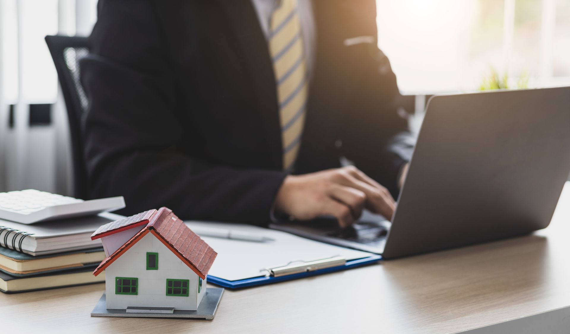 Concept image of real estate legal advisor working in a lawyer's office.