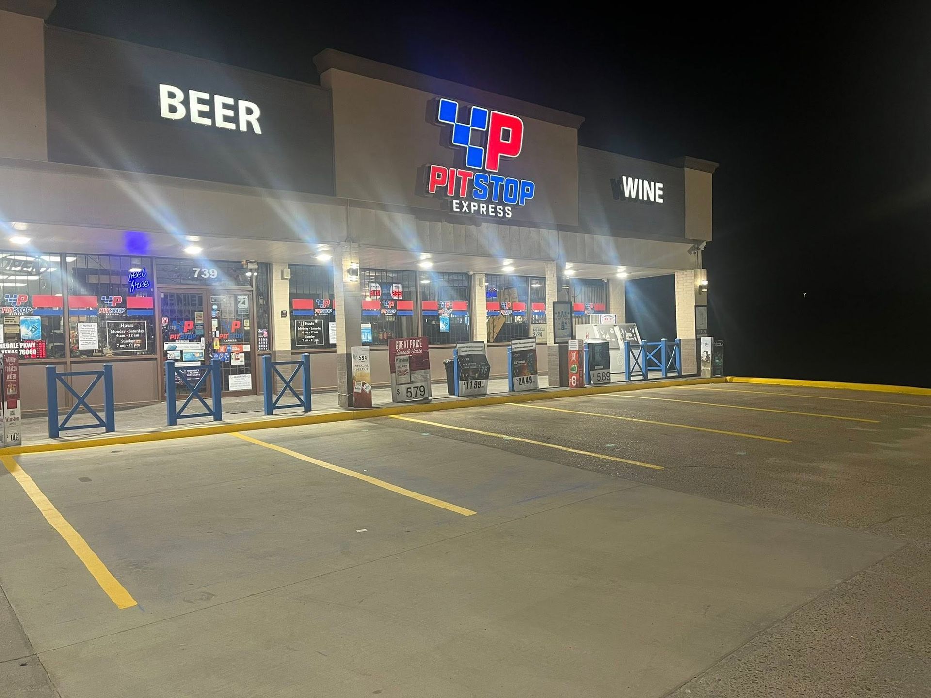 Nighttime shot of a convenience store with