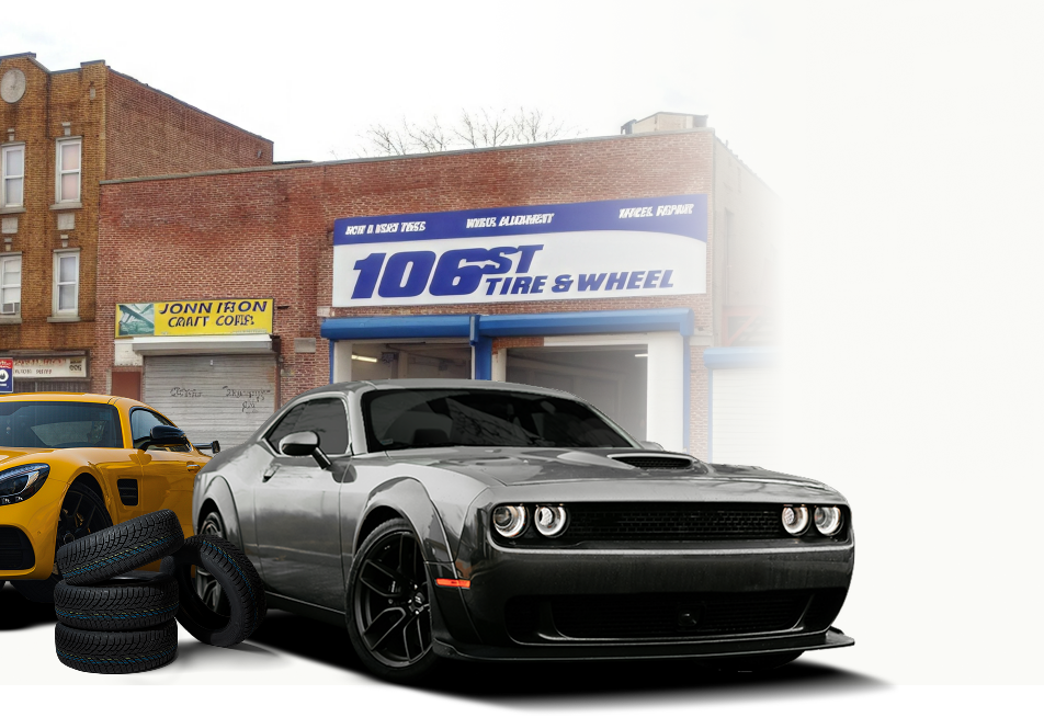 Black Dodge Challenger in front of a 106 Tire & Wheel shop, with a yellow sports car partly visible at left | 106 St Tire & Wheels