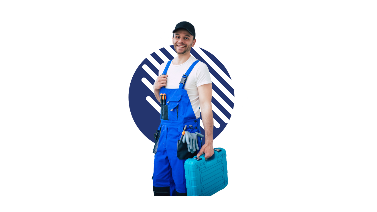 A man in blue overalls is holding a blue toolbox.