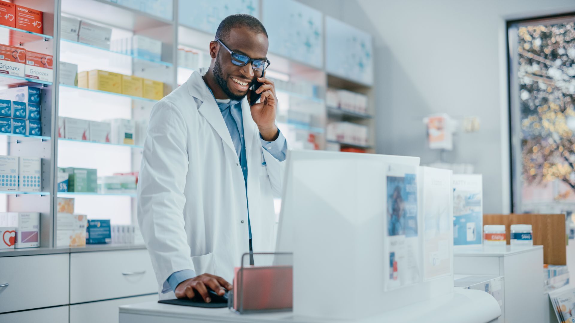 Pharmacist talking on the phone