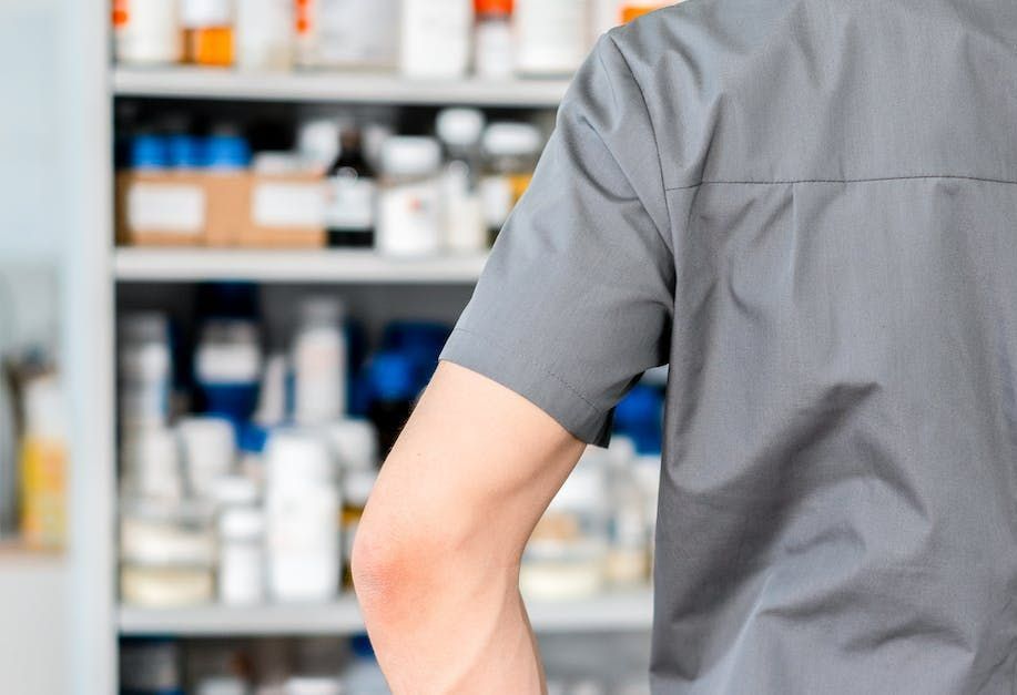 Pharmacist holding a tablet