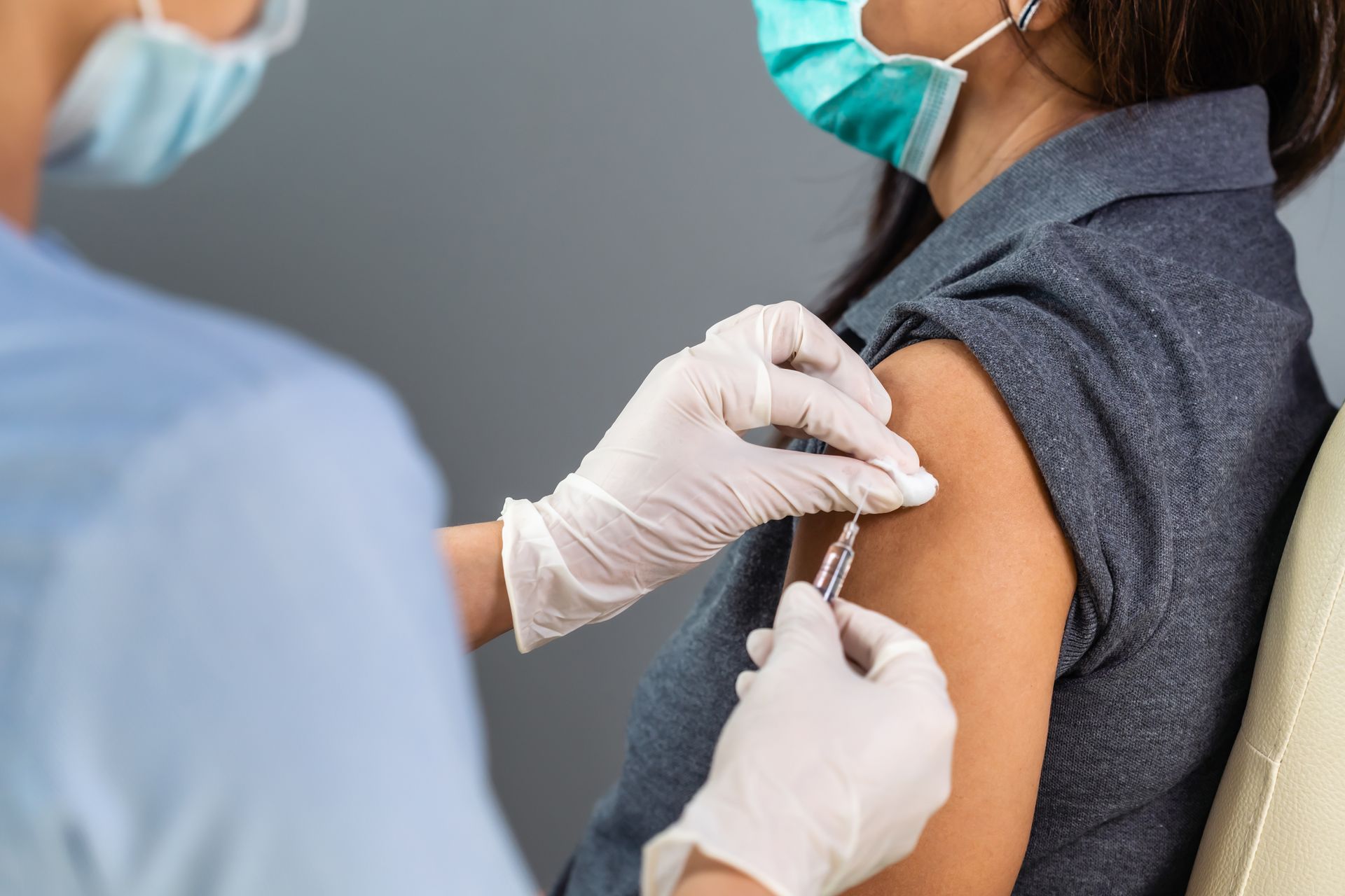 A man having a vaccine shot