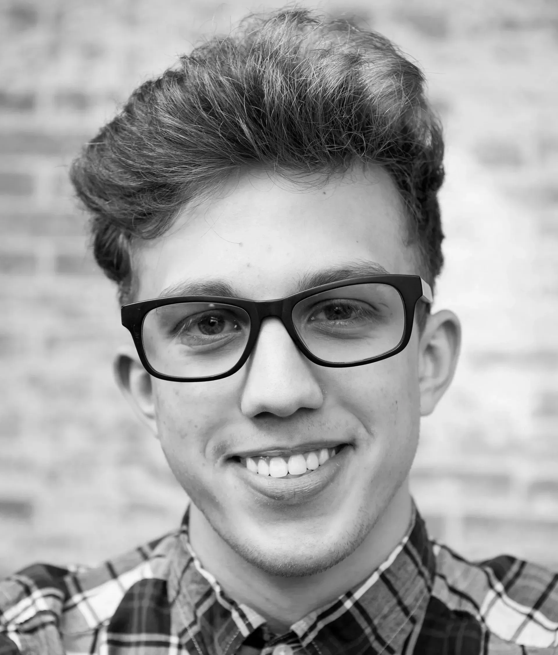 Young man with a healthy, even smile after cosmetic dentistry near Southampton