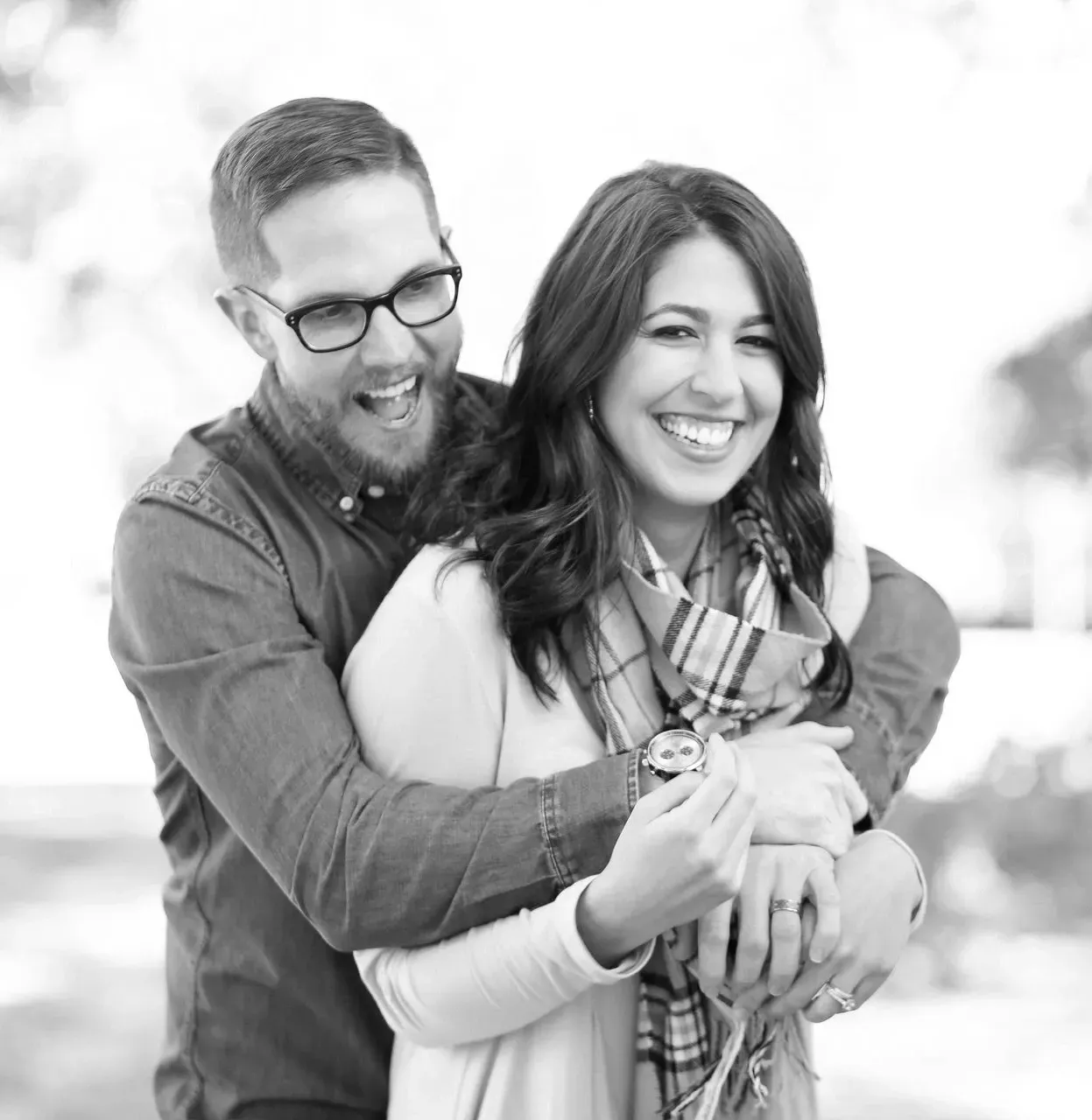 Happy couple embracing outdoors, hyperhidrosis treatment at ORION Dental near Southampton
