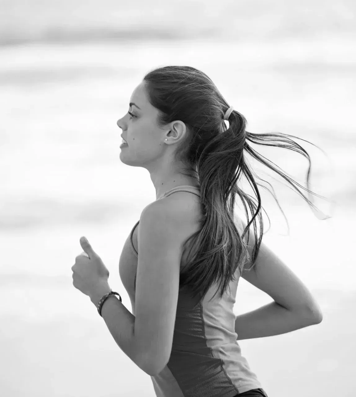 Active woman jogging outdoors, hyperhidrosis (excessive sweating) treatment at ORION Dental near Southampton